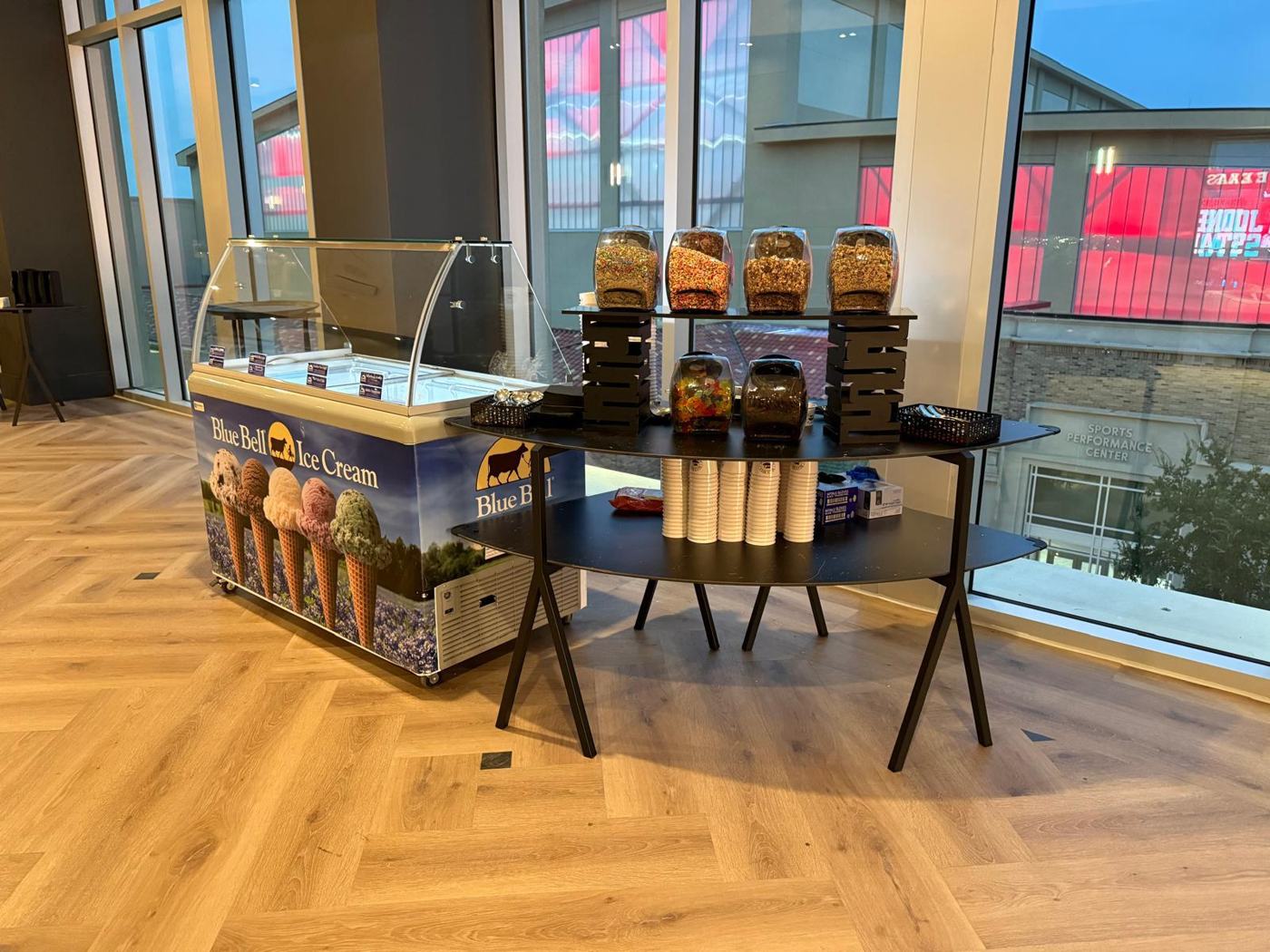 Self-serve dispensers in a stadium suite